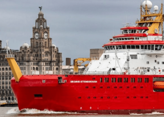 Sir-david-Attenborough-800×420 A red and white research ship named Sir David Attenborough sails past the Liver Building in Liverpool.